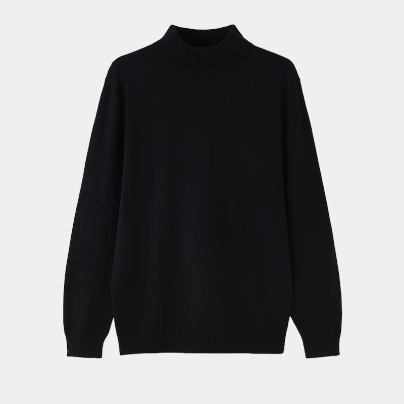 Black turtleneck sweater on a light gray background