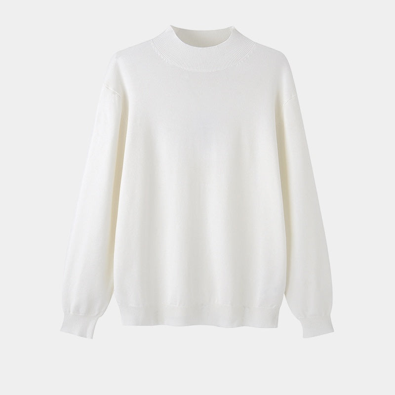 White sweater on a light gray background