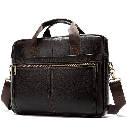 Brown leather briefcase with shoulder strap on a white background