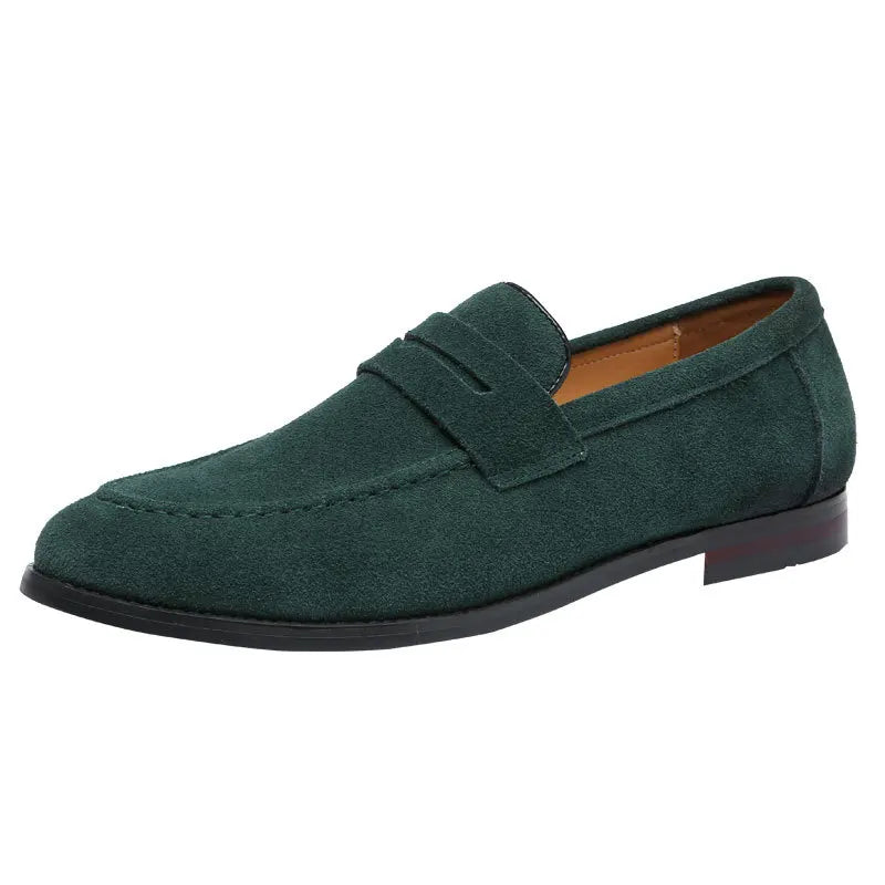 Green suede loafer shoe on a white background