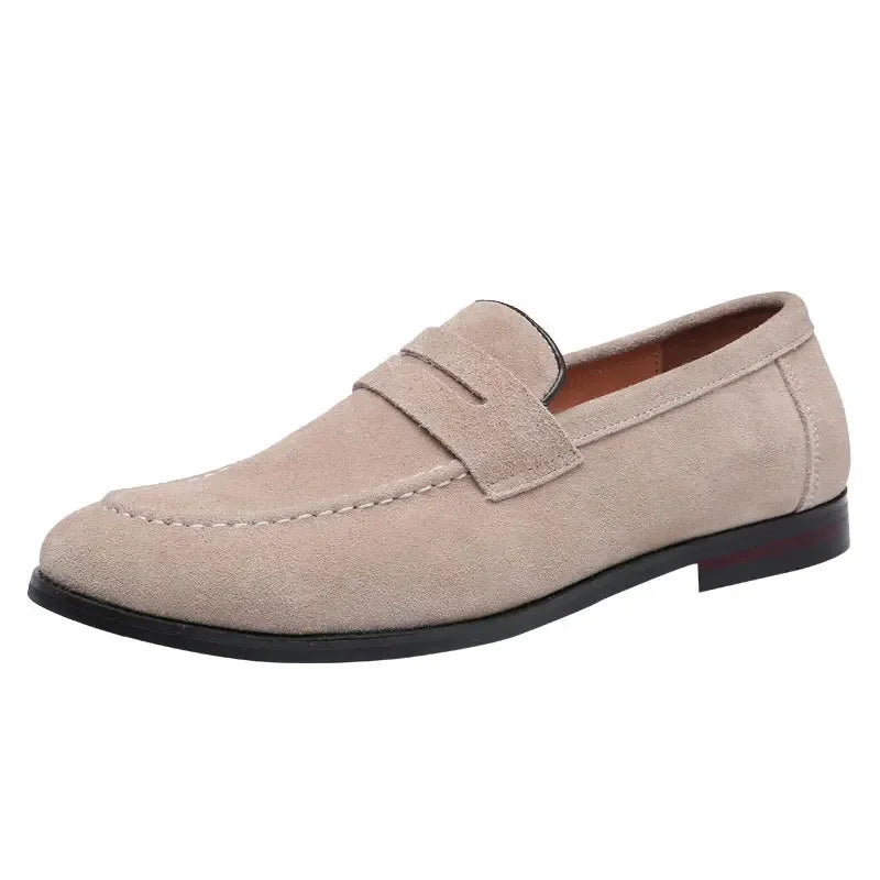 Beige loafer shoe on a white background