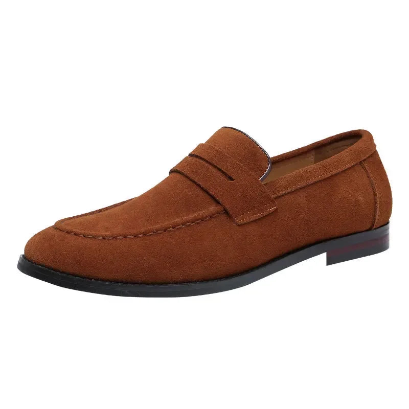 Brown suede loafer shoe on a white background